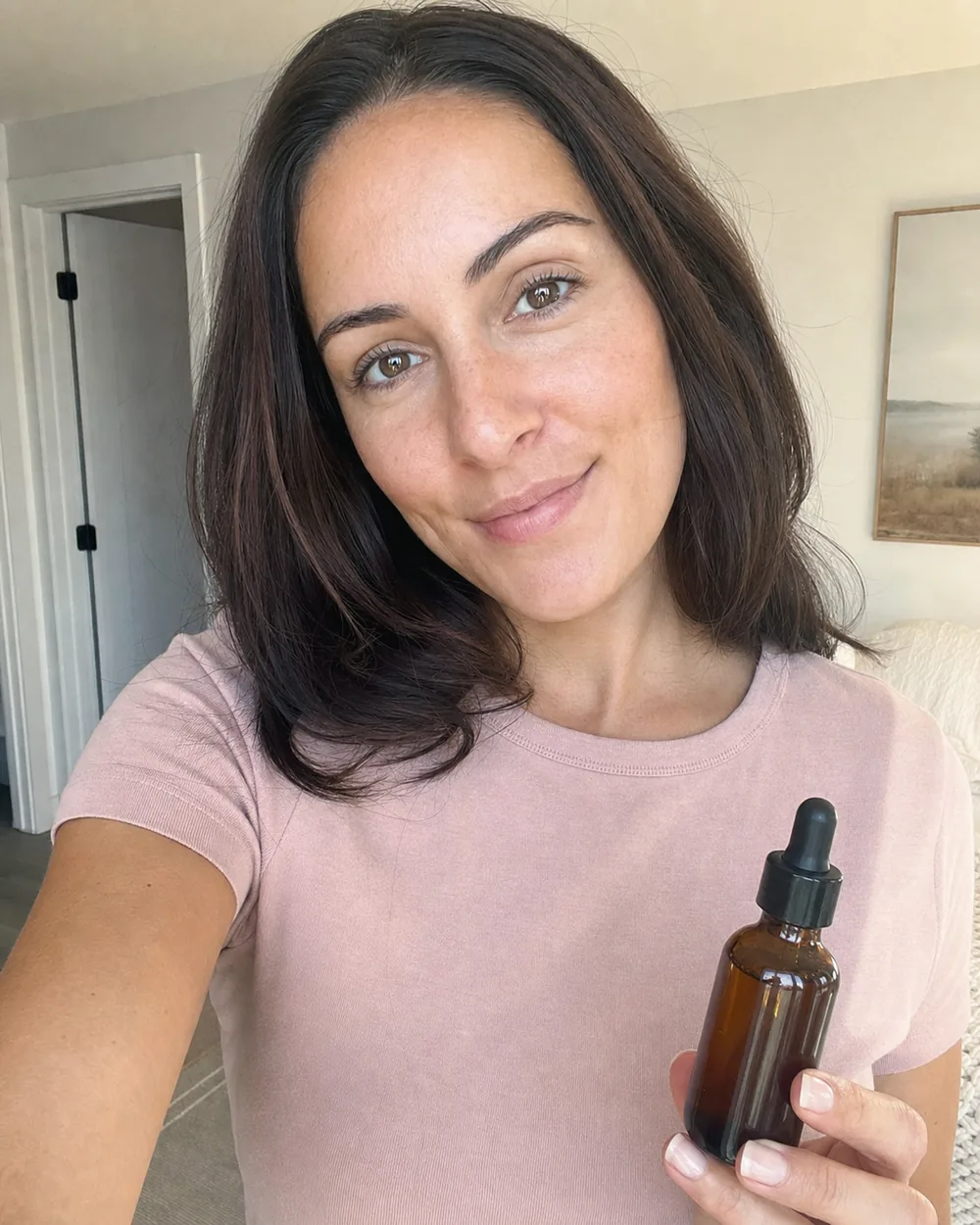 Creator presenting a product in a casual selfie